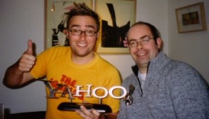 Danny Wallace and Jon Primrose, receiving the Yahoo Find of the Year award in the Weird and Wonderful category in January 2004 for Join Me.